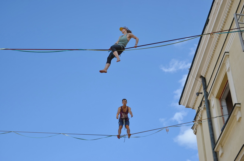 29 - Slackliners performing high above the ground in Lublin, Poland, during the annual Urban Highline Festival